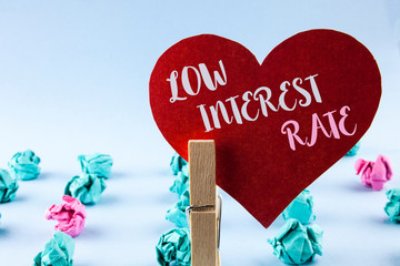 Handwriting text Low Interest Rate. Concept meaning Manage money wisely pay lesser rates save...