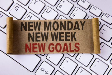 Conceptual hand writing showing New Monday New Week New Goals. Business photo showcasing next week resolutions To do list Goals Targets written Folded Cardboard Paper Piece placed Keyboard.