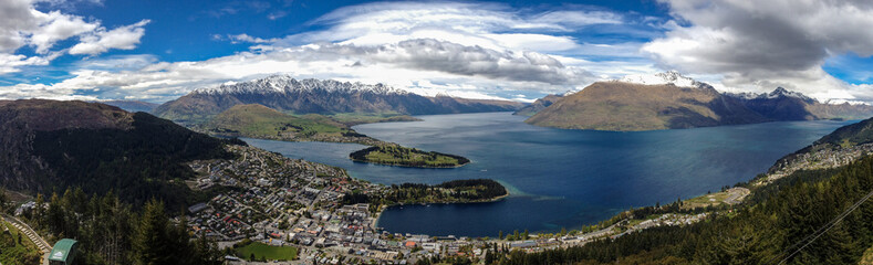 A panorama of Queenstown and Lake Wakatipu taken from the Skyline lookout high above Queenstown