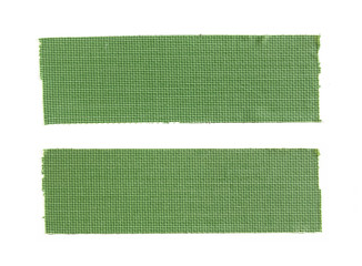 Two pieces of green cloth gaffer tape isolated on white background.