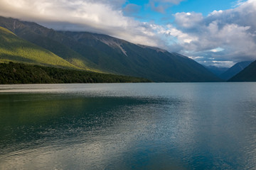 A view down the length of the incredibly beautiful Rotoiti Lake surrounded by mountains which is part of the Nelson Lakes National Park
