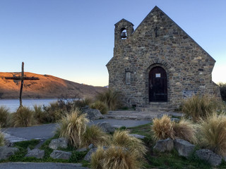 The small but stunning Chuch of the Good Shepherd as the golden rays of sunrise lights up the...