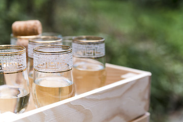 Top view of champagne glasses in wooden crate