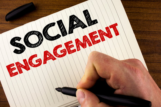 Conceptual Hand Writing Showing Social Engagement. Business Photo Showcasing Post Gets High Reach Likes Ads SEO Advertising Marketing Written By Man Notebook Book Wooden Background Marker.