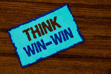 Text sign showing Think Win-Win. Conceptual photo Negotiation strategy for both partners to obtain benefits written Sticky note paper the Wooden background.
