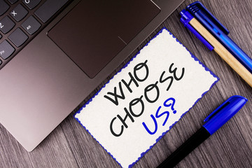 Word writing text Who Choose Us Question. Business concept for Kind of people that select our Services or Products written White Sticky Note Paper the wooden background Laptop Markers