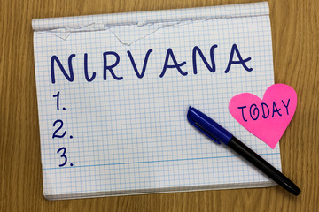 Writing note showing Nirvana. Business photo showcasing Transcendent state of mind Meditation Ideal place Zen lifestyle Square Notebook ripped pages marker heart romantic ideas wooden table