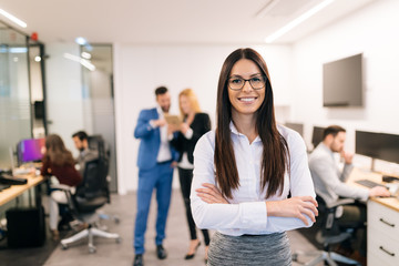 Obraz premium Portrait of successful beautiful businesswoman in office