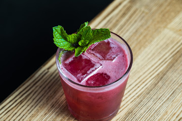 Red cocktail with mint