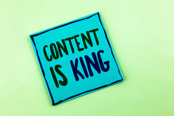 Conceptual hand writing showing Content Is King. Business photo showcasing articles or posts can guarantee you success Advertising written Sticky Note Paper the plain background.