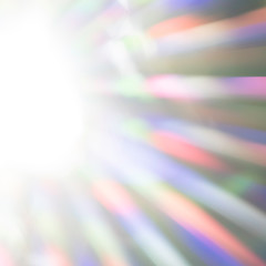 Abstract and natural wallpaper or background with the rays of light. Natural sunlight showing the intensity of the visible sunlight in the colors red, orange, yellow, green, blue, indigo and violet.