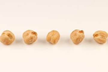 Chickpeas pea several on a white background
