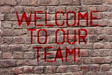 Writing note showing Welcome To Our Team. Business concept for introducing another demonstrating to your team mates Brick Wall art like Graffiti motivational call written on the wall