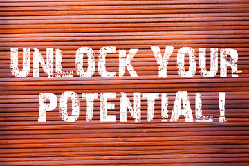 Word writing text Unlock Your Potential. Business photo showcasing release possibilities Education and training is key Brick Wall art like Graffiti motivational call written on the wall
