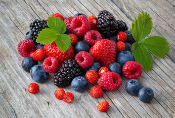 Ripe berries on a wooden board