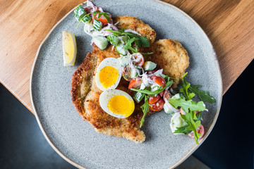 Eggs and meat on a plate