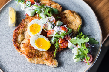 Eggs and meat on a plate