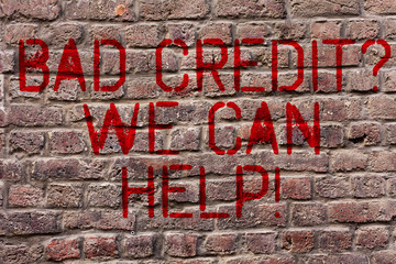 Writing note showing Bad Credit Question We Can Help. Business concept for offering help after going for loan then rejected Brick Wall art like Graffiti motivational call written on the wall