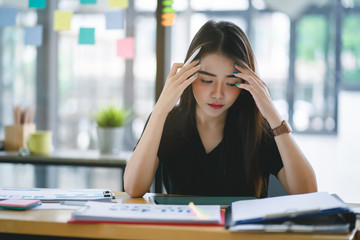 Confused business woman with stressed and worried about  working mistake and problems.
