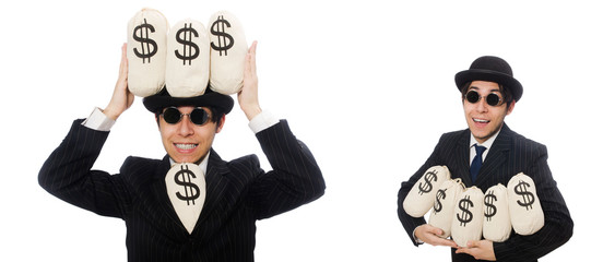 Young employee holding money bags isolated on white