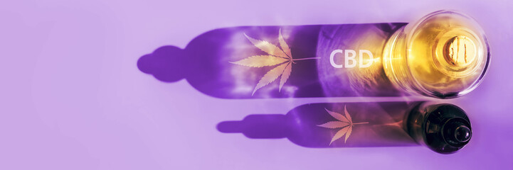 Trendy sunlight and shadows from CBD oil bottles on light background Composition, minimalism,...