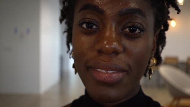 Smiling portrait of a young African American woman