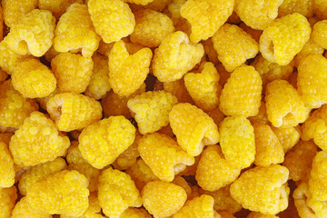 Yellow raspberries background