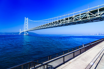 Landscape of family angler in the background of Akashi Kaikyo Bridge in the summer morning