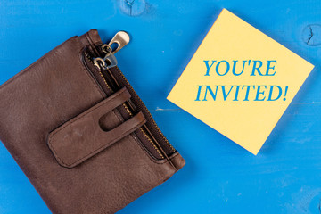 Writing note showing You Re Invited. Business concept for You are happily encouraged to attend and event or a party