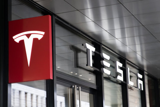 Detail from Tesla store in Basel, Switzerland. It is an American company that specializes in electric automotives founded at 2003.