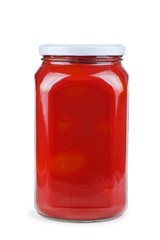 Glass jar with tomato juice isolated on white background