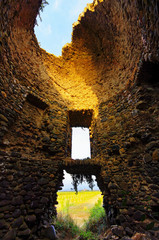ruin of Genoese tower in eastern plain of Corsica island