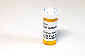 Prescription bottle with Lorezapam on a white background. Lorezapam is a generic prescription anti-anxiety medication. A concept for mental health.