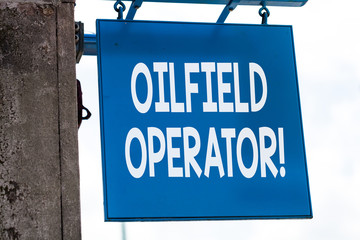 Writing note showing Oilfield Operator. Business concept for responsible for optimizing production...