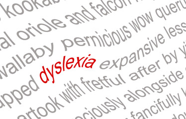 Close up of the word dyslexia printed on a piece of white paper