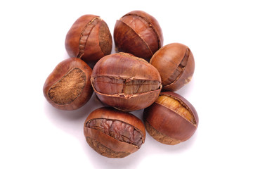 some roasted chestnuts isolated oin a white background