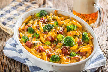 Baked pasta penne with broccoli smoked pork neck mozzarela cheese and othe ingredients