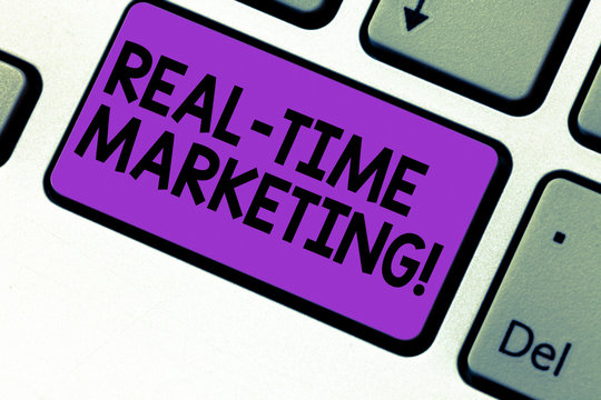 Writing note showing Real Time Marketing. Business photo showcasing Creating a strategy focused on current relevant trends Keyboard key Intention to create computer message pressing keypad idea