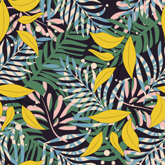 Trending abstract seamless pattern with colorful tropical leaves and plants on black background. Vector design. Jungle print. Floral background. Printing and textiles. Exotic tropics. Summer.