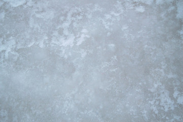Blue and gray ice texture, natural ice background with frost and snow pattern