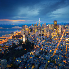 San Francisco Downtown at sunrise. California famous city at sunrise. Bay Bridge and Port of San Francisco in background