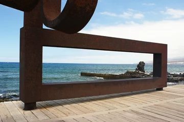 Selbstklebende Fototapeten Scenic View of a Iron sculpture in Tenerife Spain © vali_111