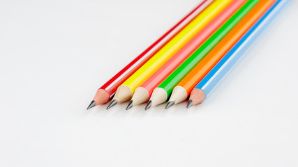 bright and colorful pencils on white background