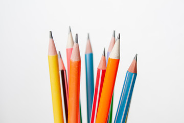 bright and colorful pencils on white background