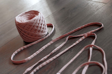 ball of pink knitted yarn. knitting pink yarn