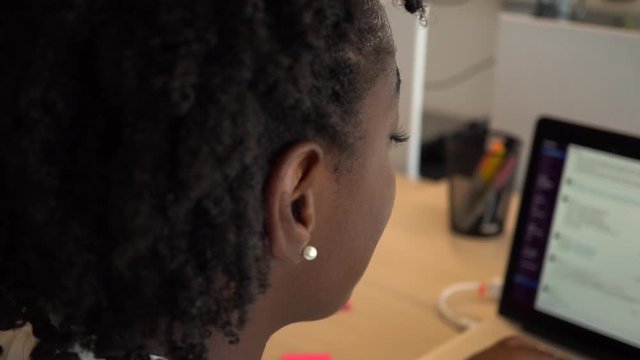 Black Businesswoman Using Office Chat, Slack, Communicating To Company