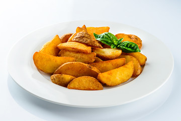 rustic french fries slices on a light background