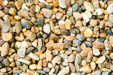 small colorful pebbles full frame abstract background