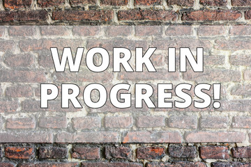 Writing note showing Work In Progress. Business concept for People is working right know to deliver...