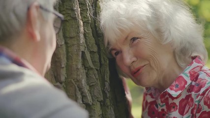 Old couple on date in park